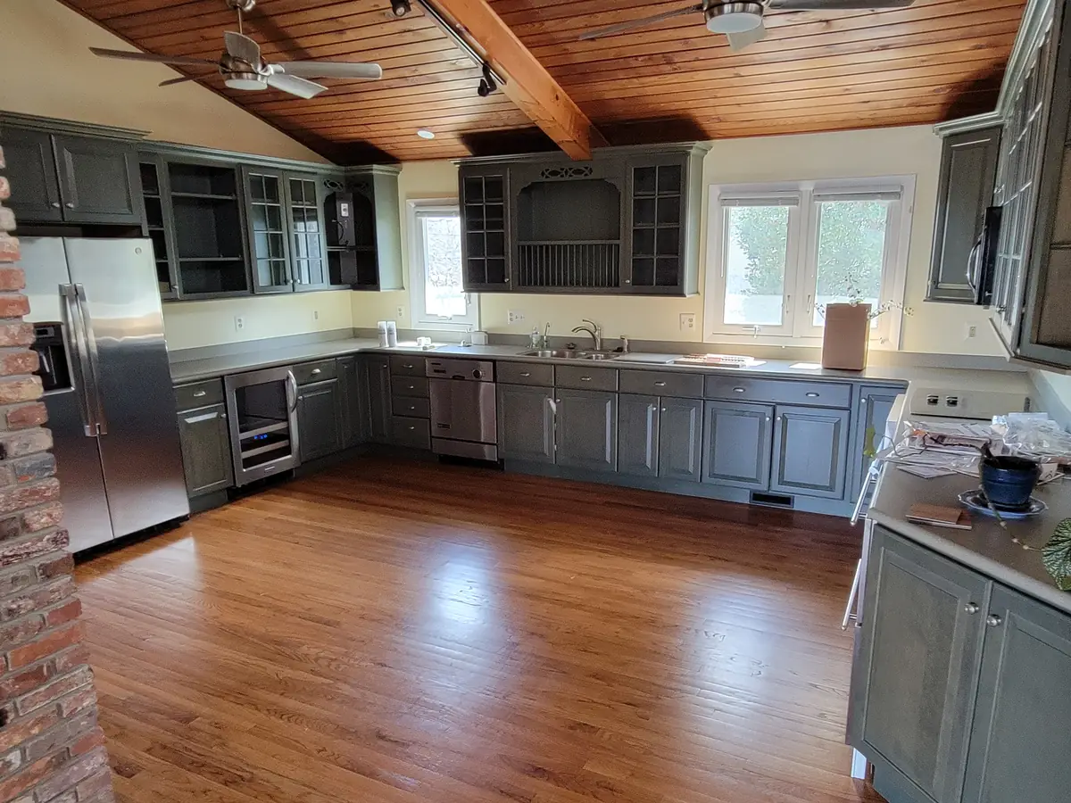 Bright kitchen remodel with white cabinetry