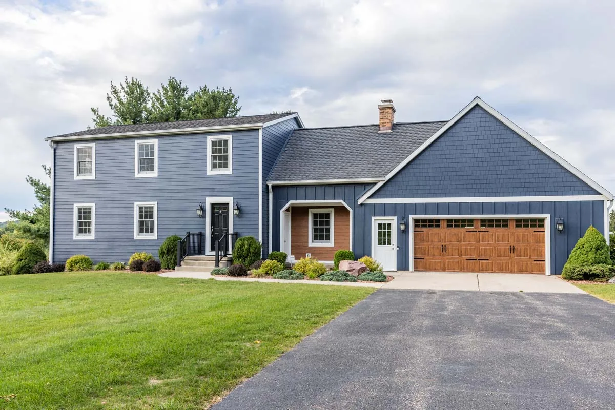 Maryland home exterior with finished roofing and siding work